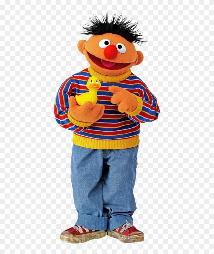 ernie from sesame street is an orange character, shown with his yellow rubber duckie